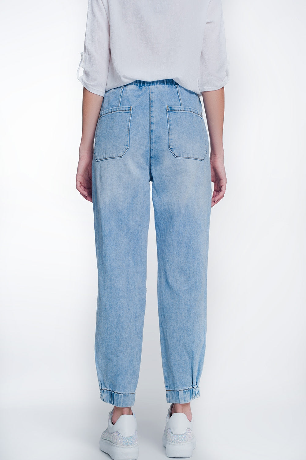 Joggers di jeans strappati blu lavaggio chiaro