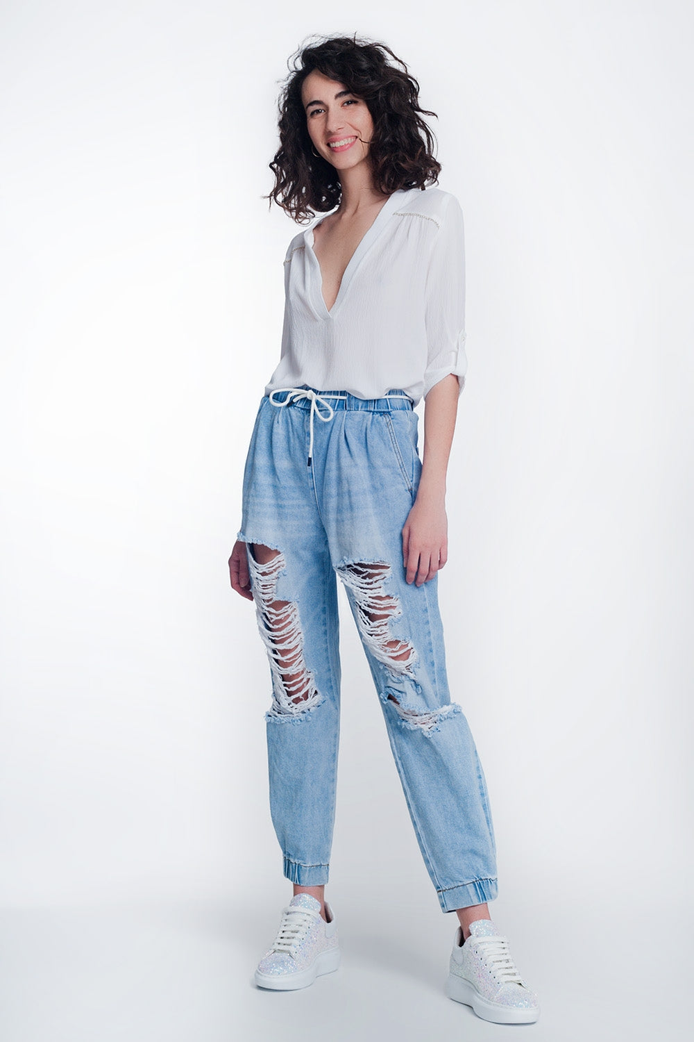 Joggers di jeans strappati blu lavaggio chiaro