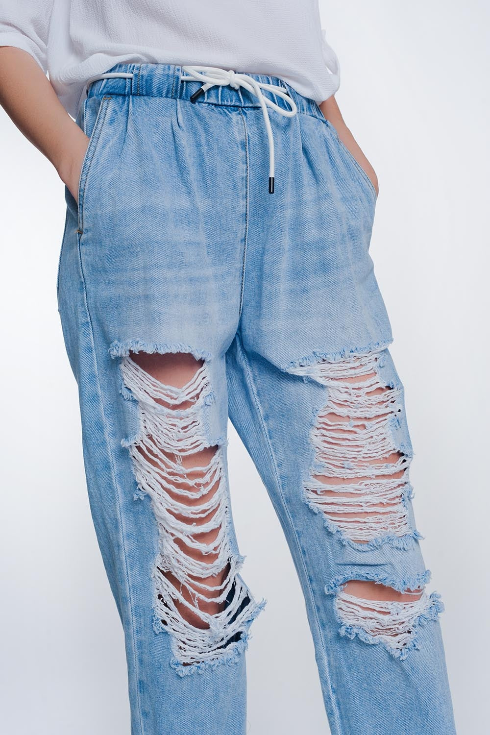 Joggers di jeans strappati blu lavaggio chiaro