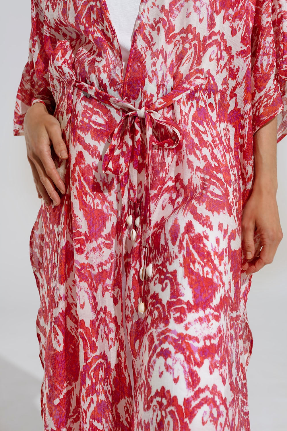 Kimono lungo rosso con chiusura a coulisse con stampa tribale