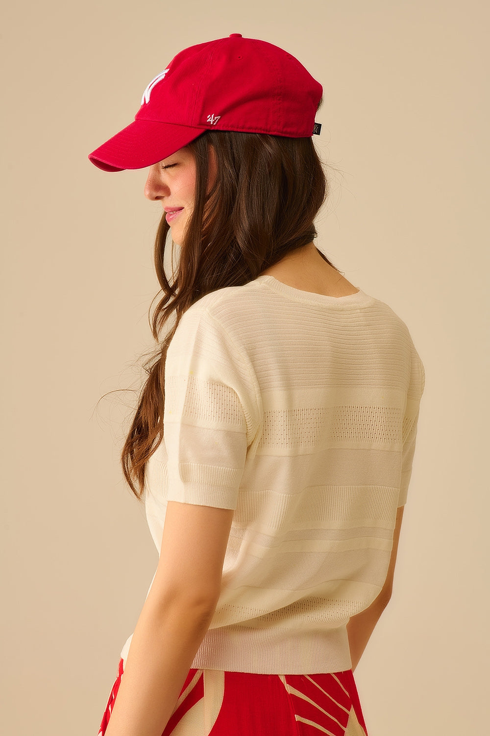 Maglia a righe testurizzate in bianco