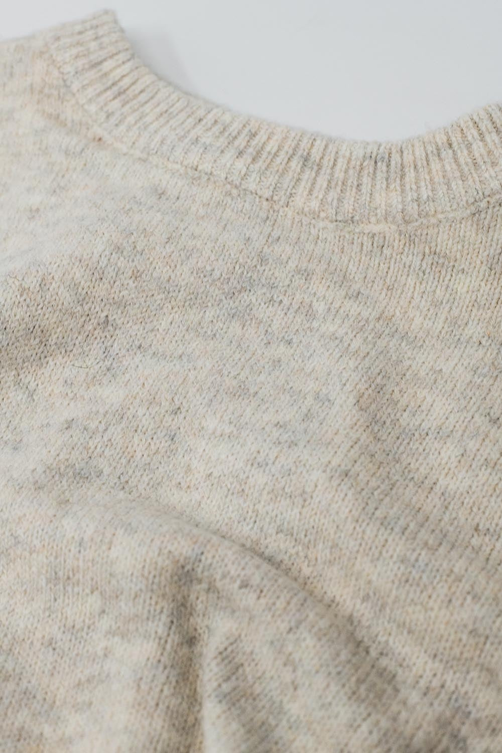 Maglia morbida ecru con maniche a palloncino