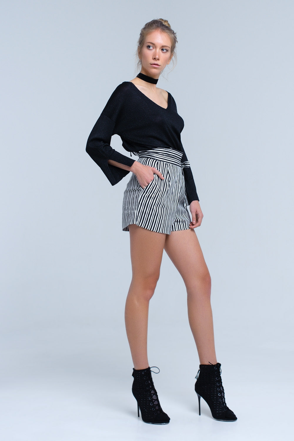 Maglia nera con dettagli in lurex oro