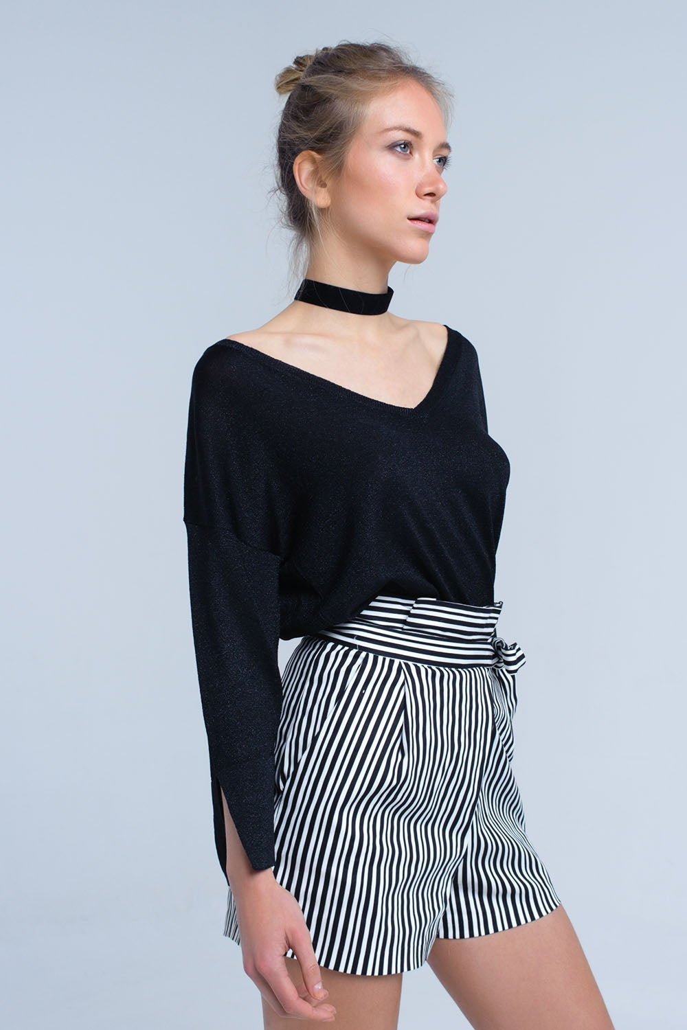 Maglia nera con dettagli in lurex oro
