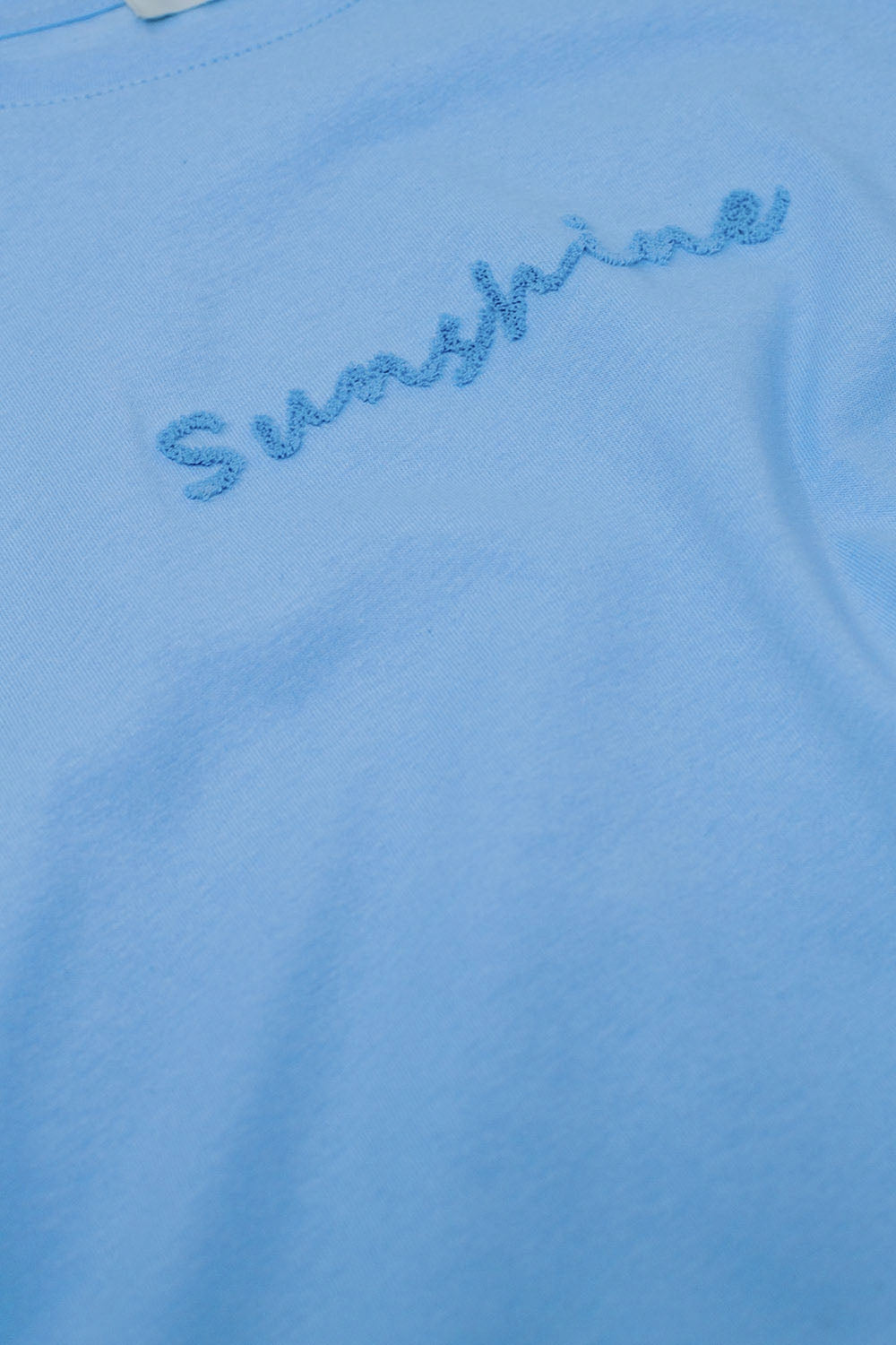 Maglietta oversize Sunshine con testo in rilievo sul davanti in blu