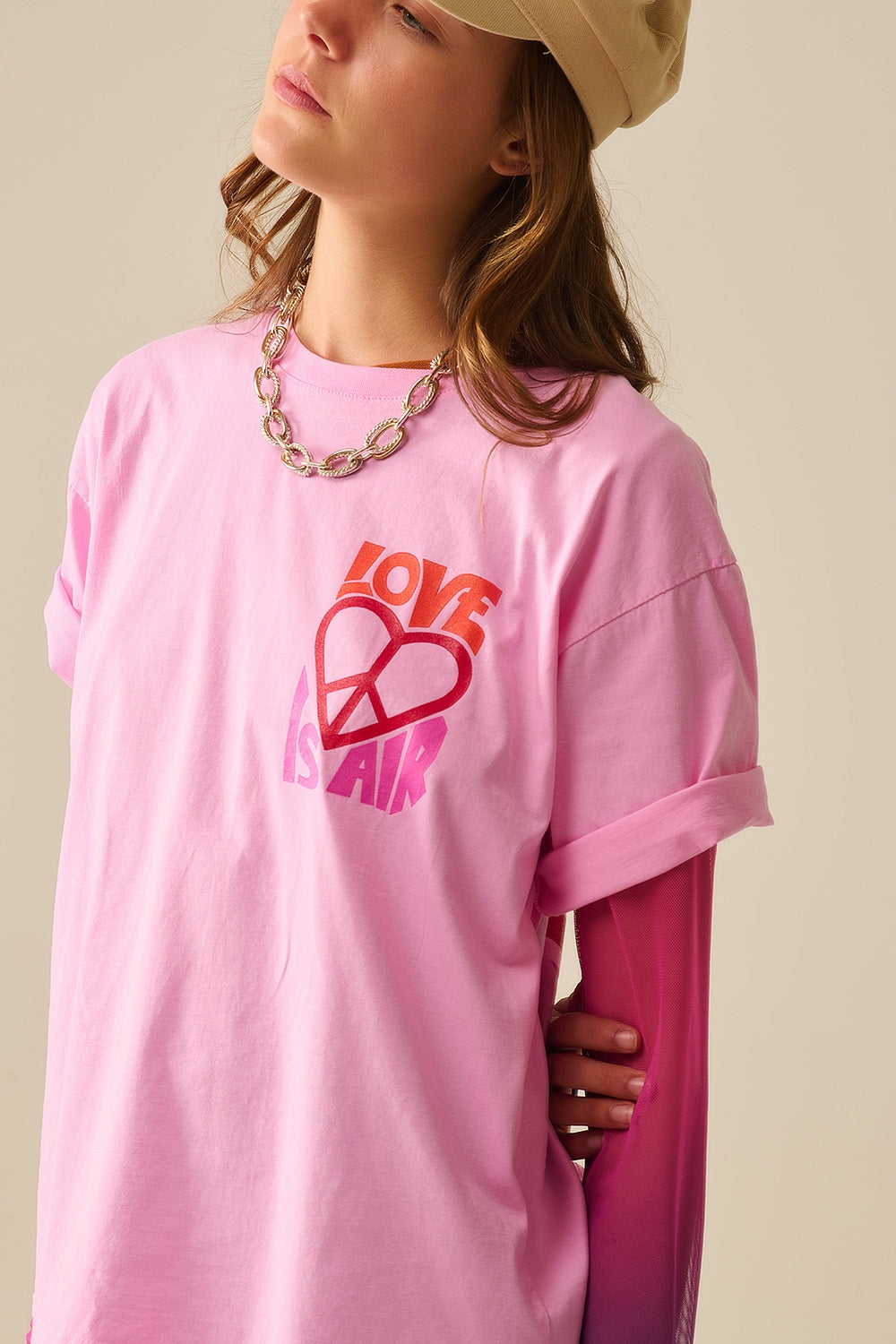 Maglietta rosa con logo Love is Air e Cuore con Pace