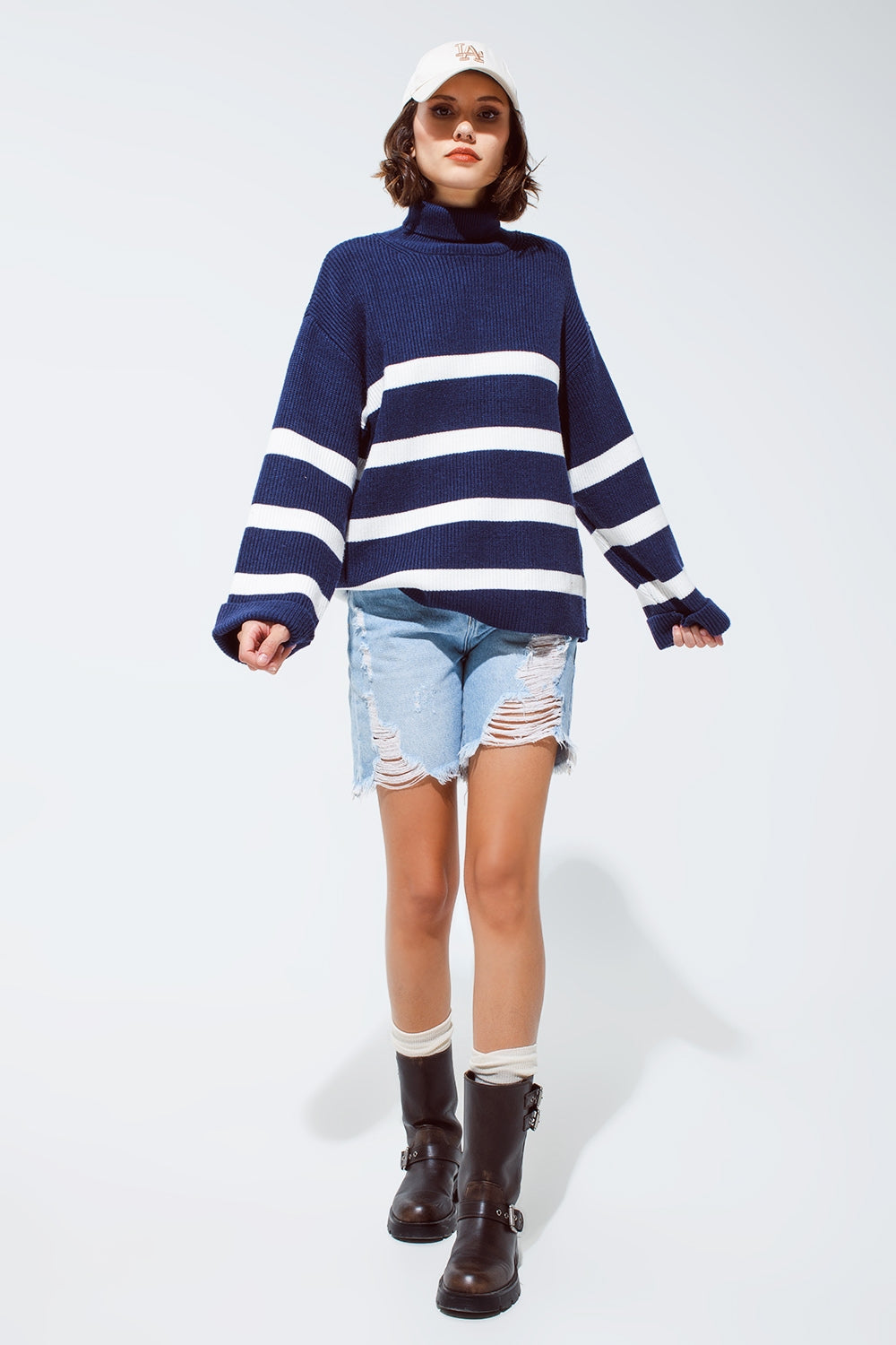 Maglione a collo alto blu navy a righe