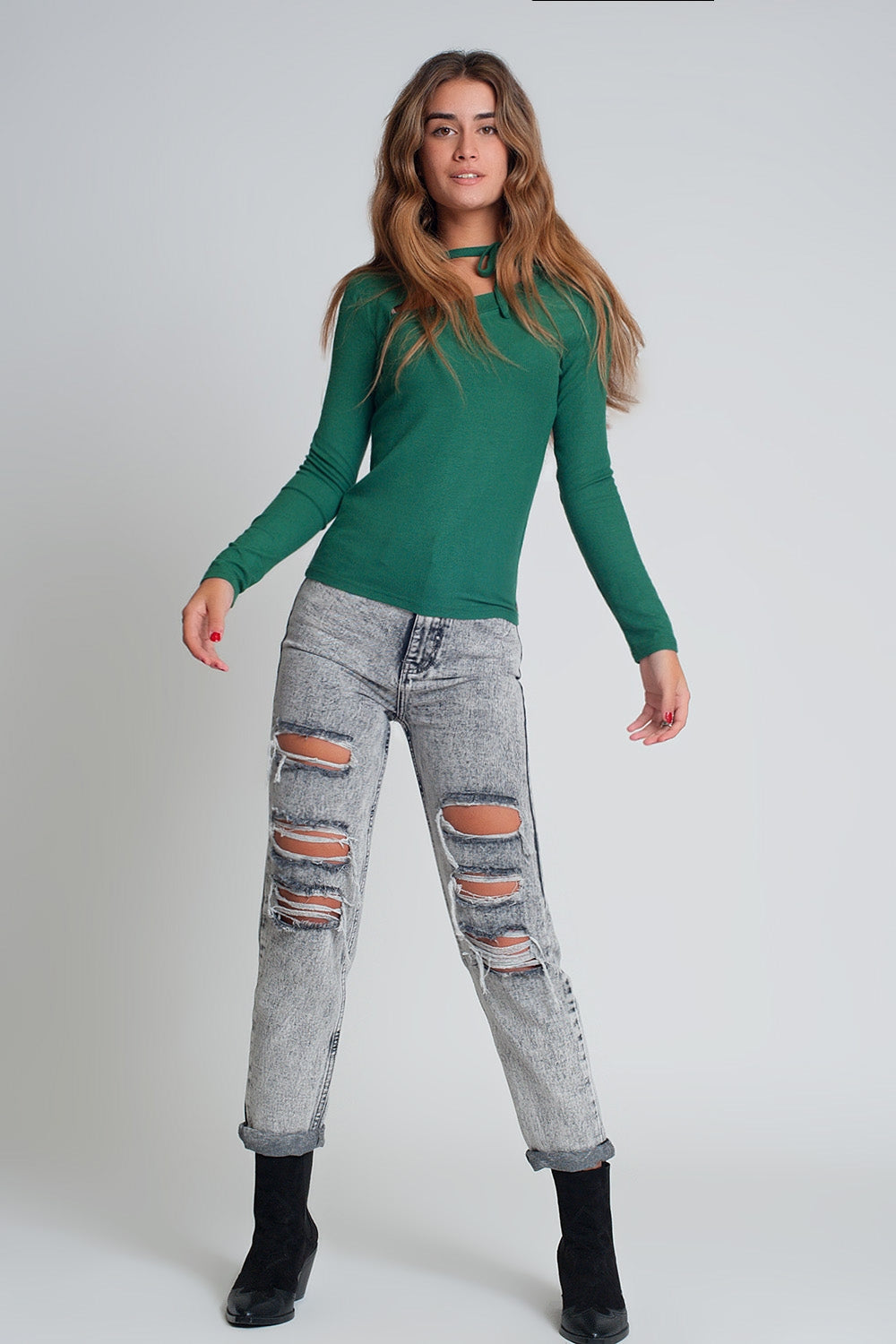 Maglione a collo asimmetrico in verde