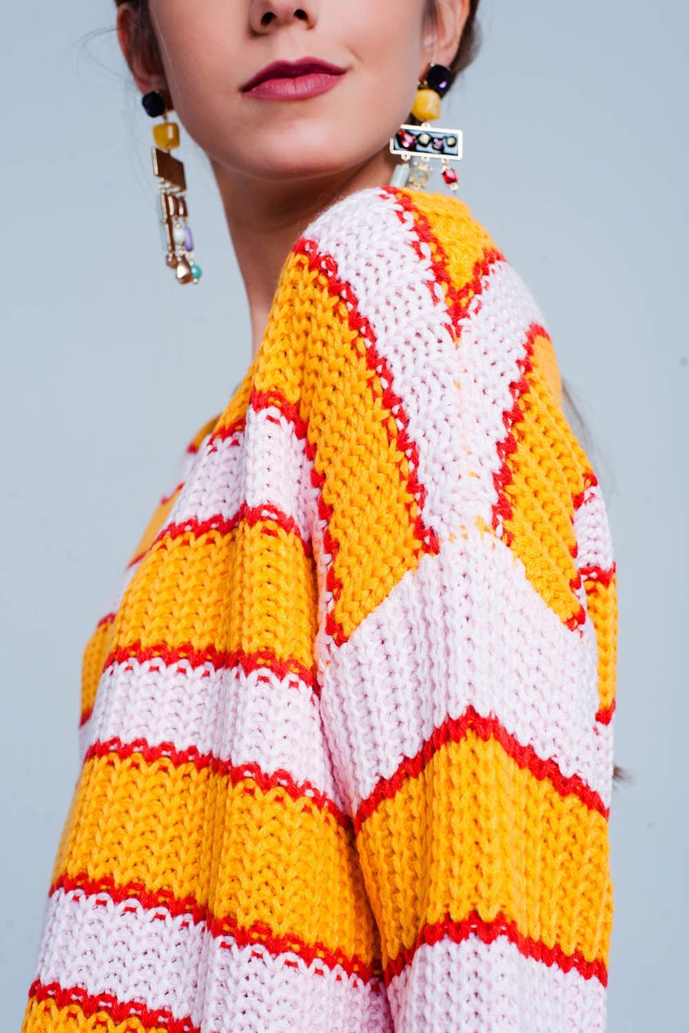 Maglione a righe colour block arancia e rosa