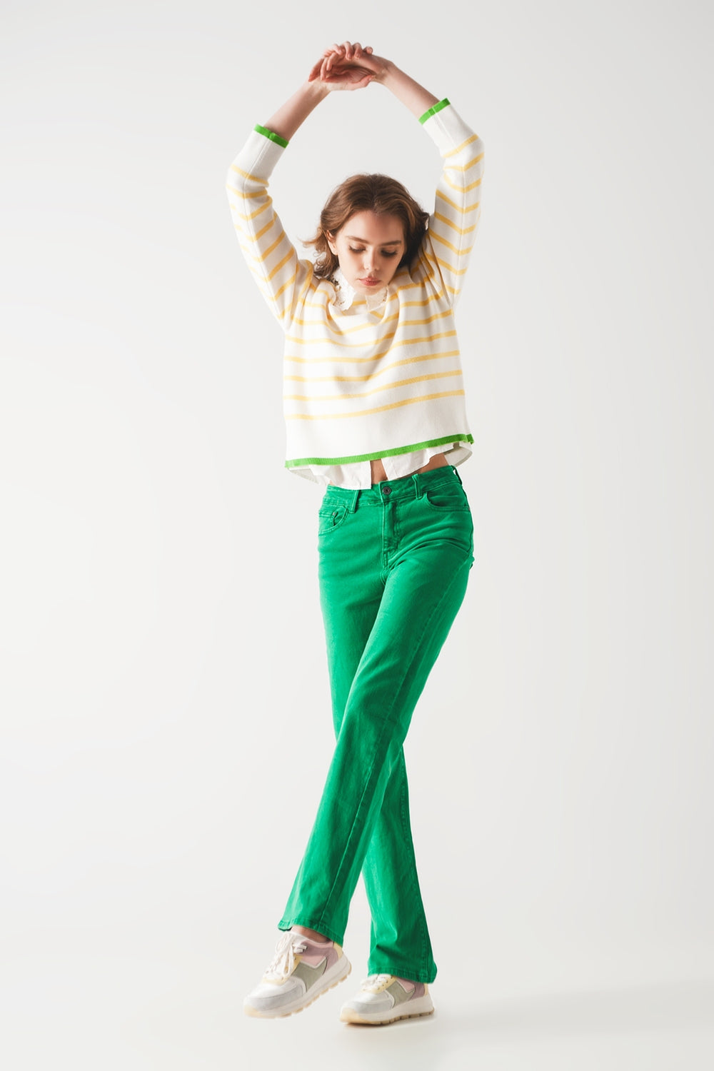 Maglione a righe in giallo e bianco