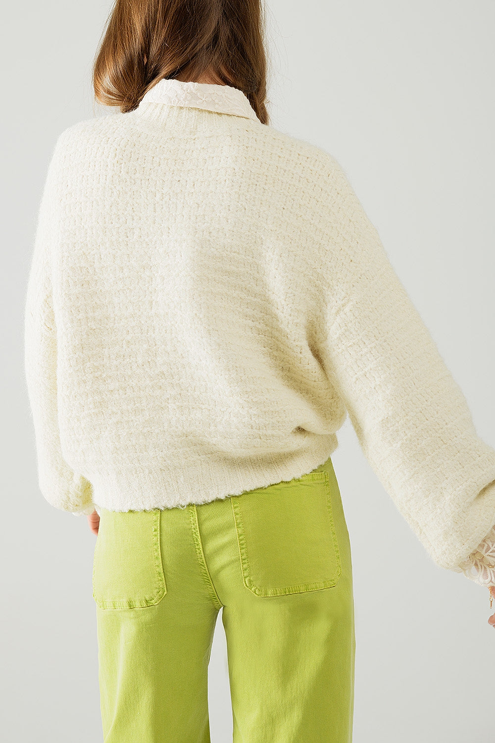 Maglione beige con maniche a palloncino