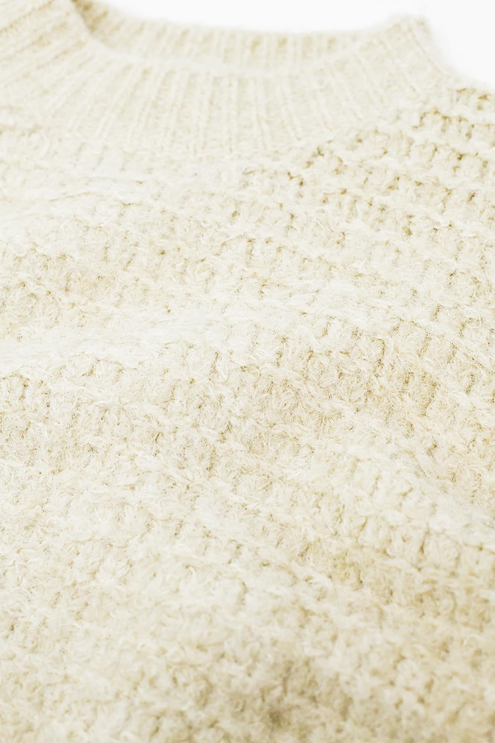 Maglione beige con maniche a palloncino