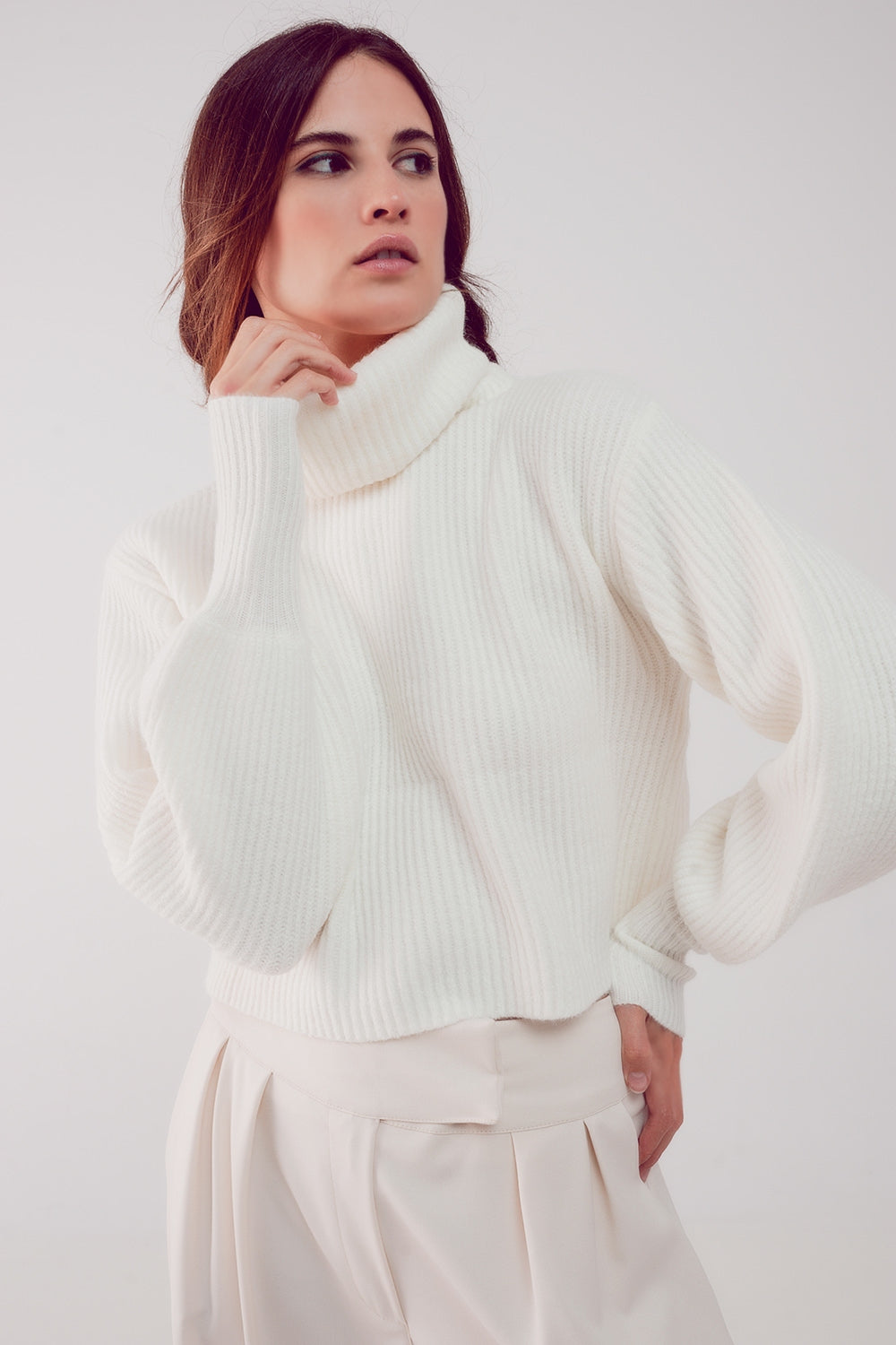 Maglione collo alto con maniche a palloncino color crema