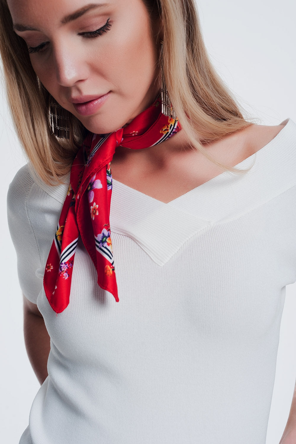 Maglione con scollo a V crema