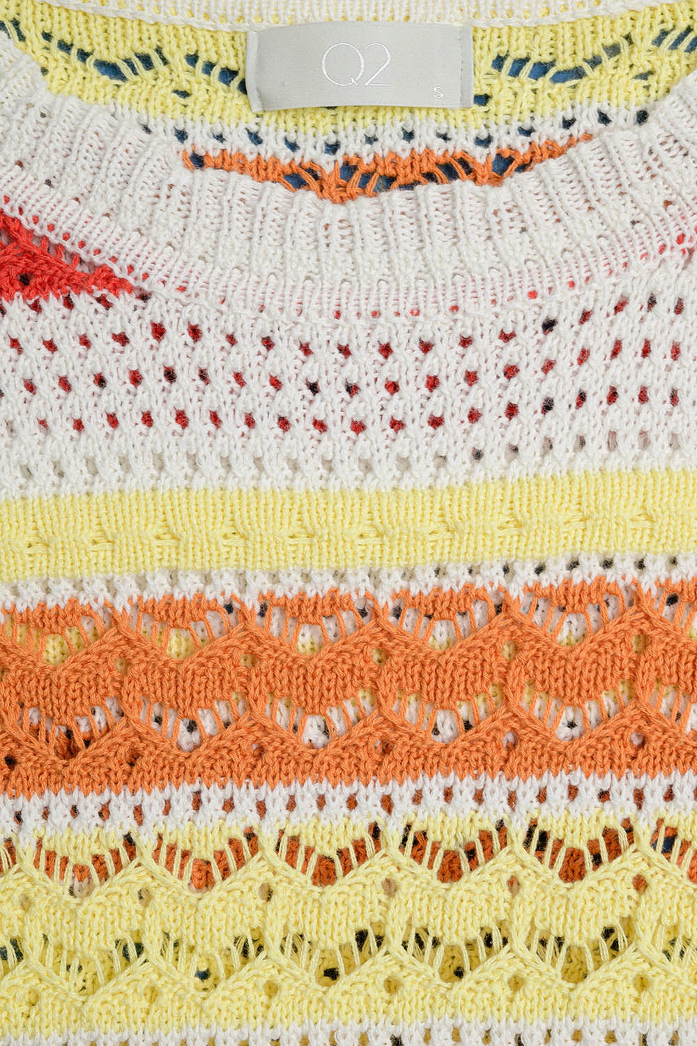 Maglione estivo a righe in maglia dai toni caldi