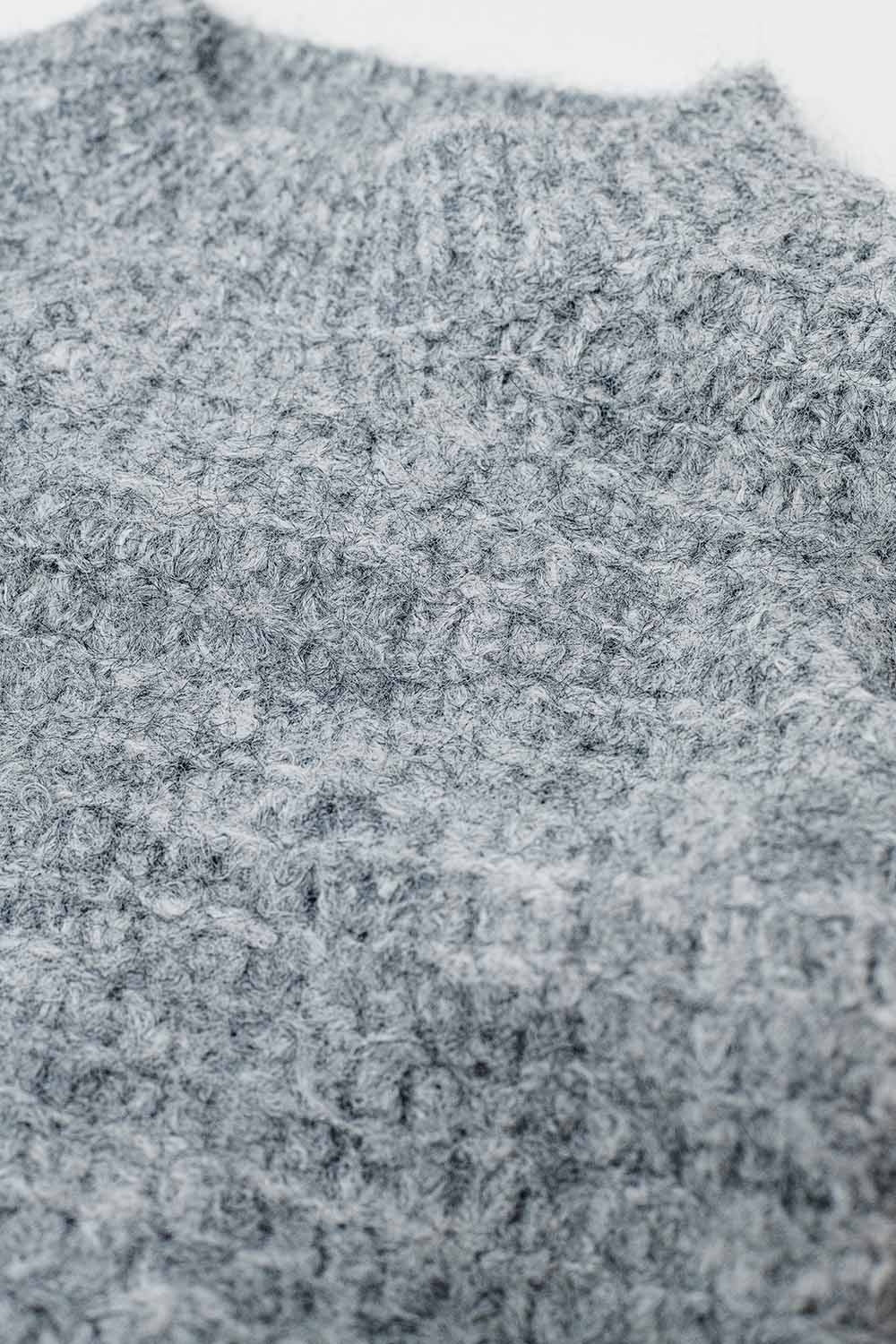 Maglione grigio oversize con maniche a palloncino