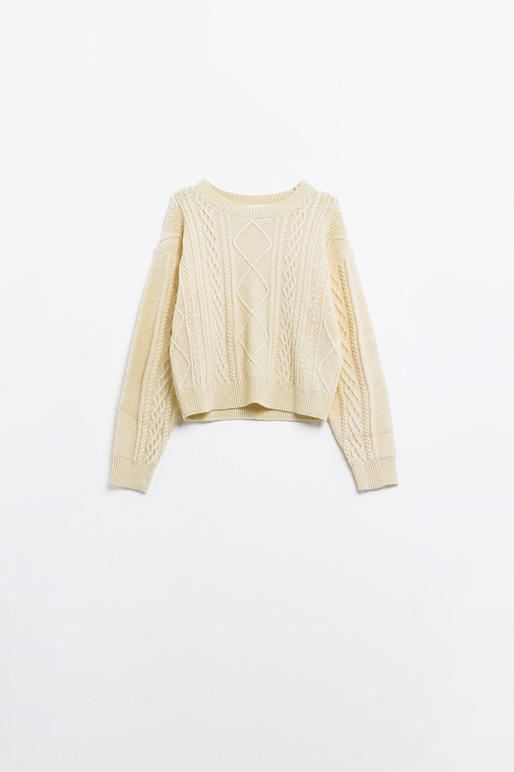 Maglione in maglia morbida color crema con motivo a cavi
