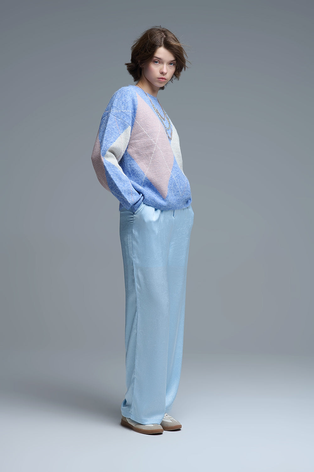 maglione largo in blu cielo con motivi a rombi