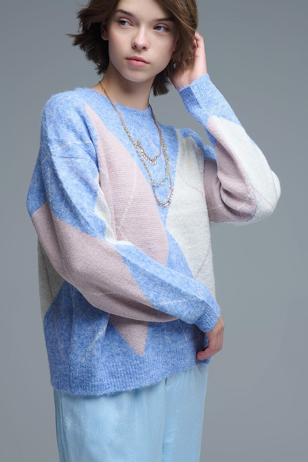 maglione largo in blu cielo con motivi a rombi