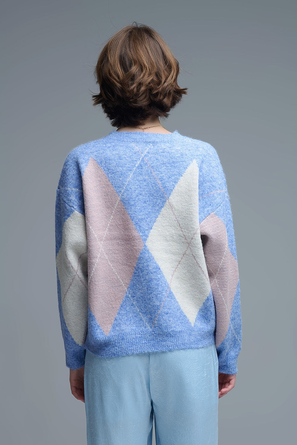 maglione largo in blu cielo con motivi a rombi