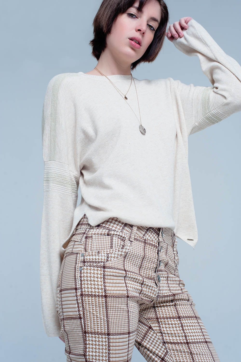 Maglione lavorato a maglia beige con dettagli glitterati