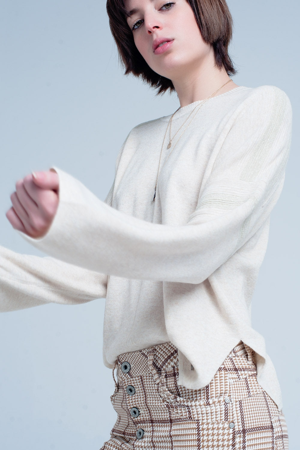 Maglione lavorato a maglia beige con dettagli glitterati