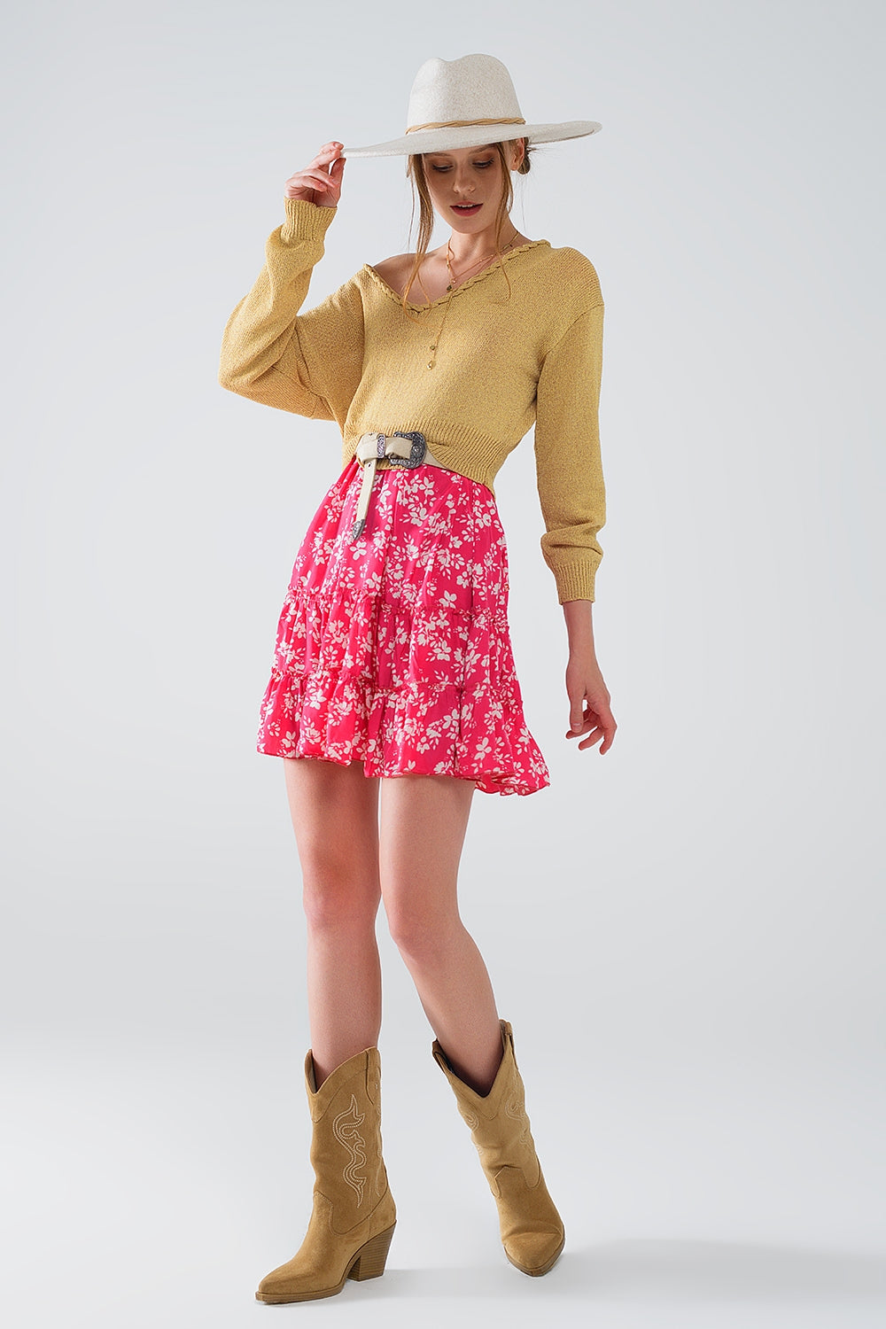 Maglione leggero con ampio scollo a V e dettaglio a treccia in oro