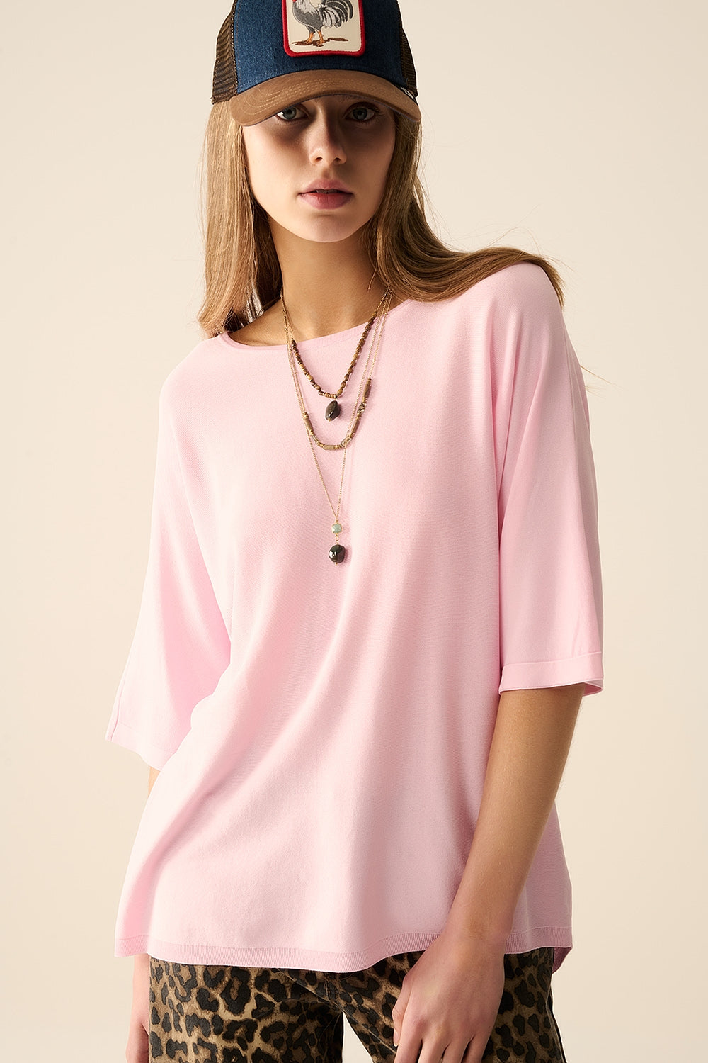 maglione oversize in rosa con maniche al gomito