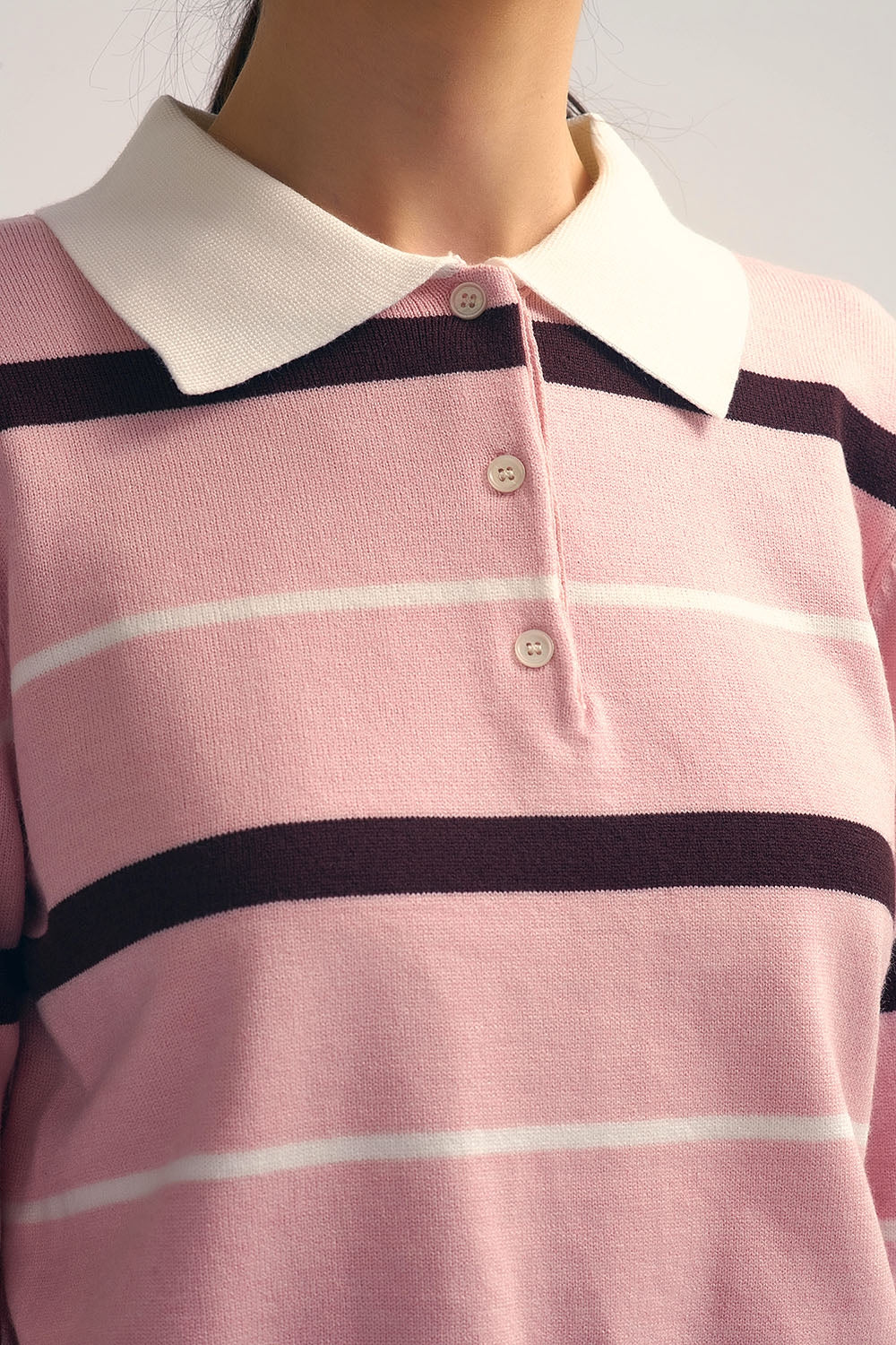 Maglione Polo a righe in rosa con colletto bianco