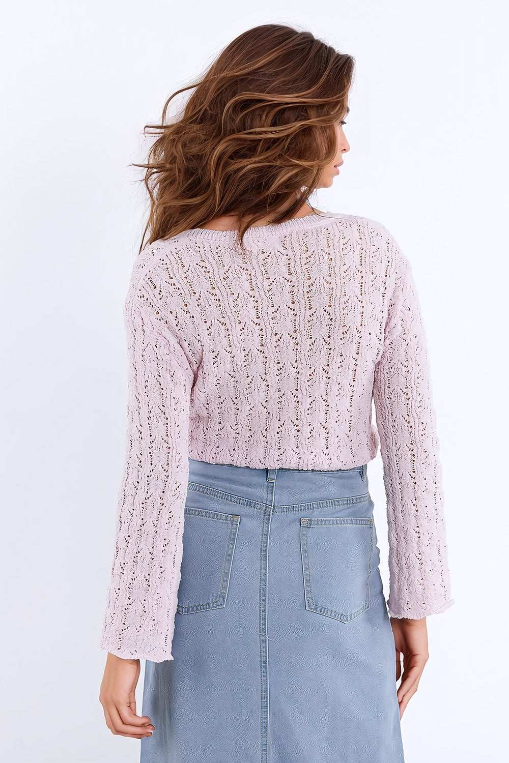 Maglione rosa con maniche svasate