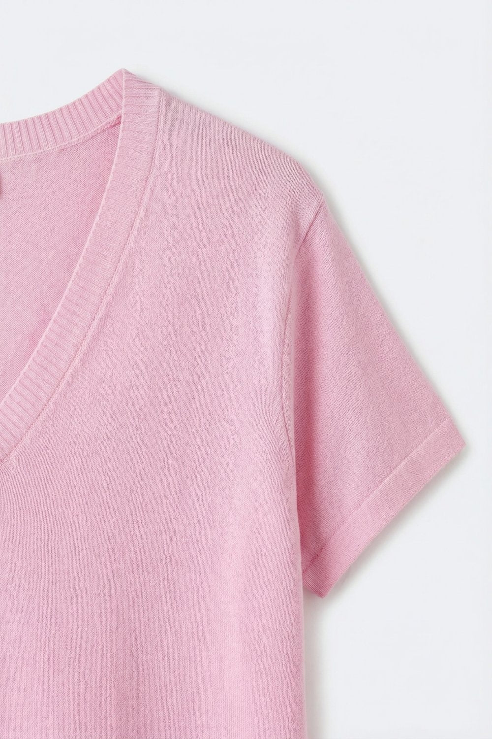 Maglione rosa con scollo a V e vestibilità rilassata