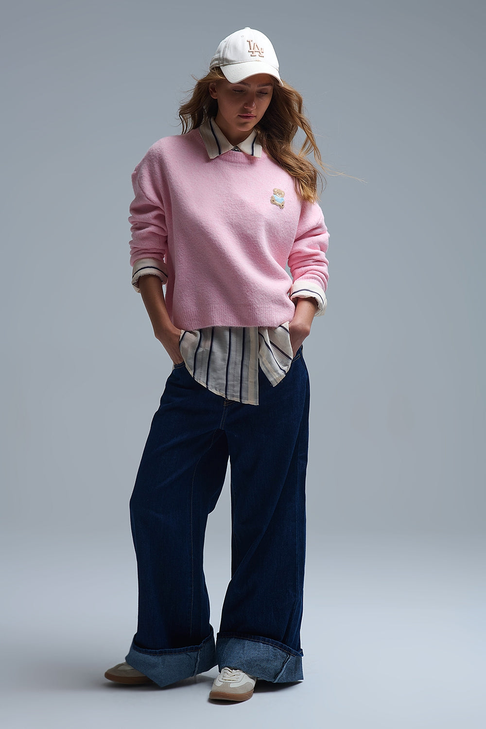 Maglione rosa con toppe a forma di orso