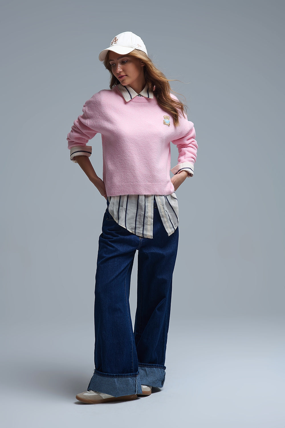 Maglione rosa con toppe a forma di orso