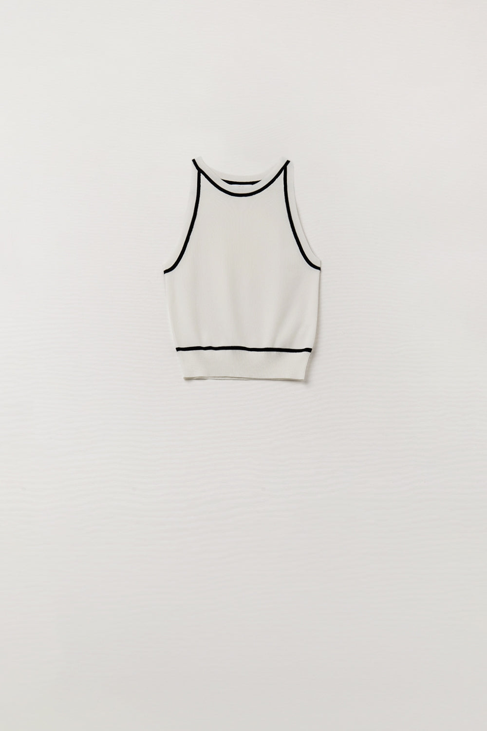 Maglione senza maniche bianco con linee nere all'esterno