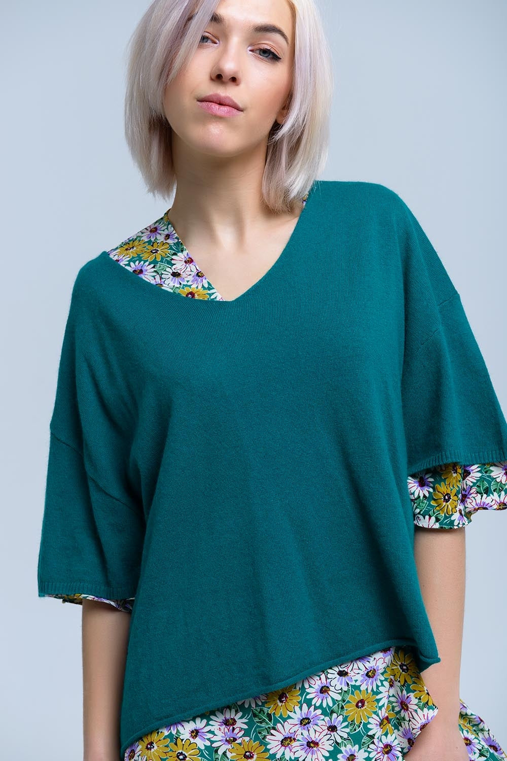 Maglione verde a maniche corte