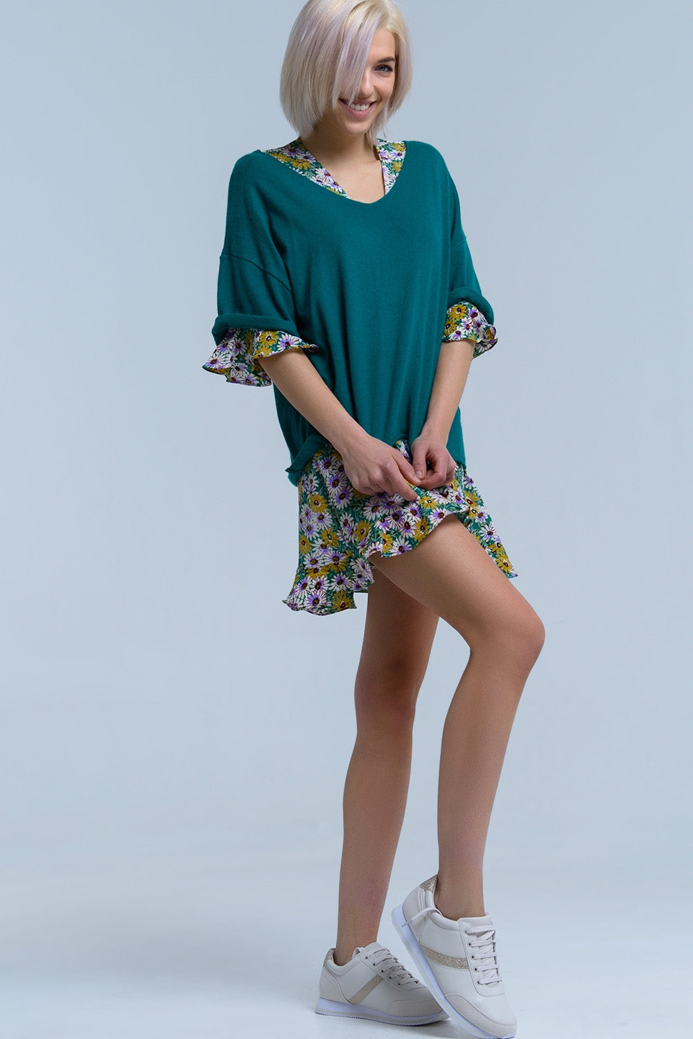 Maglione verde a maniche corte