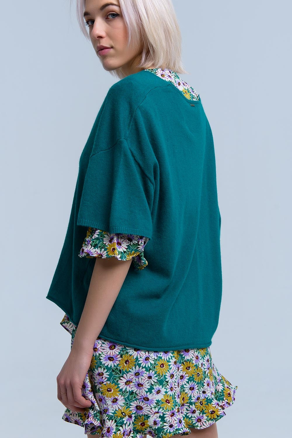 Maglione verde a maniche corte