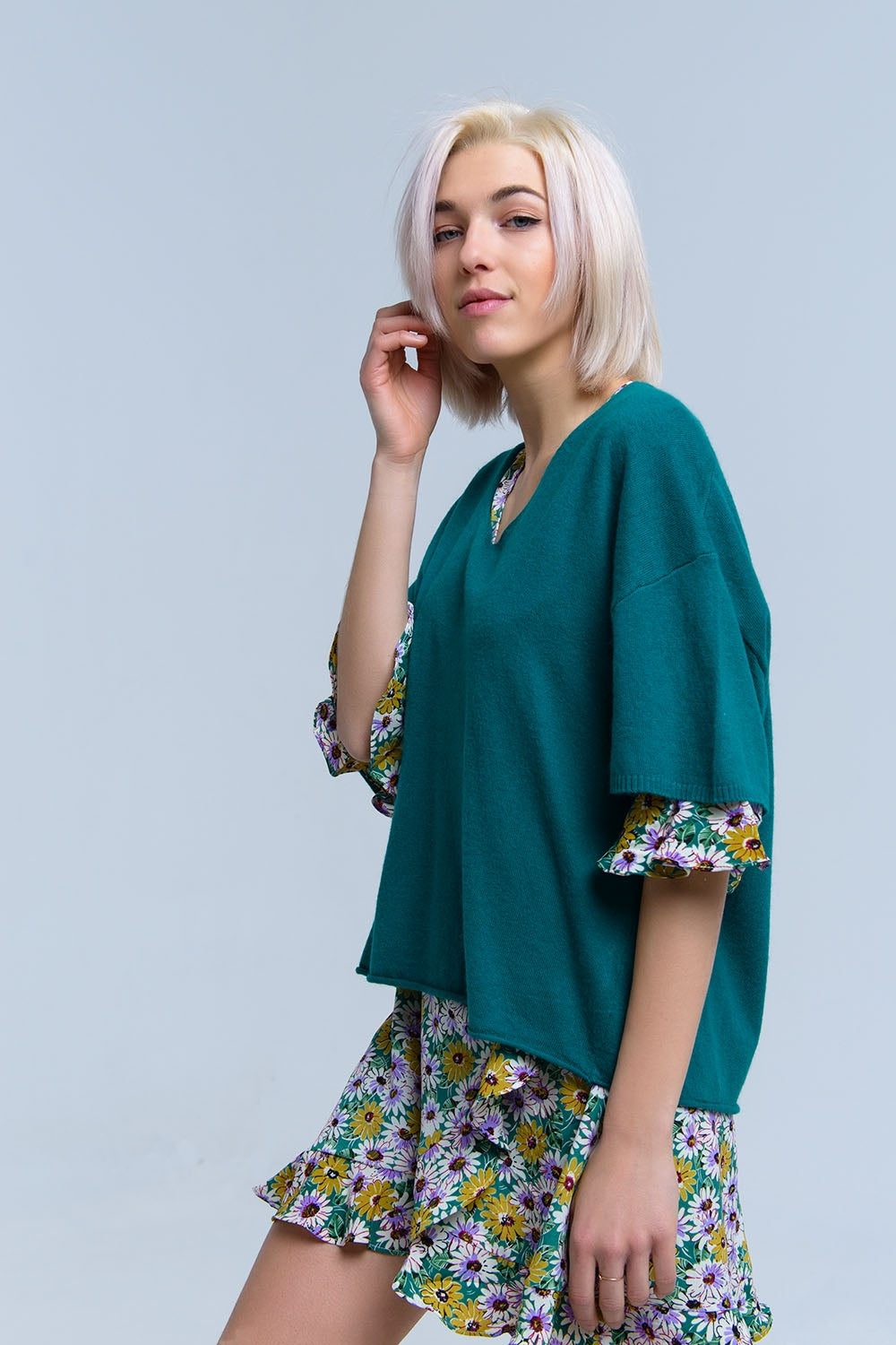 Maglione verde a maniche corte