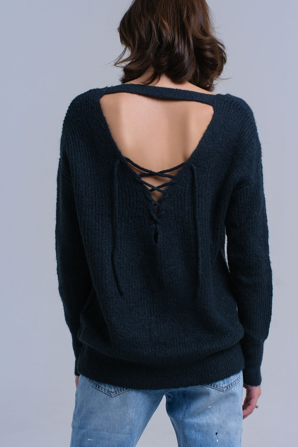 Maglione verde lavorato a maglia con chiusura a strappo