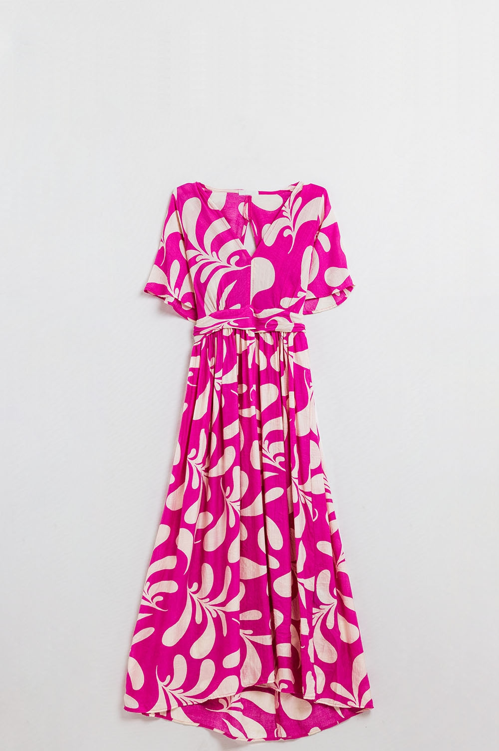 Maxi abito con stampa floreale fucsia e schiena scoperta