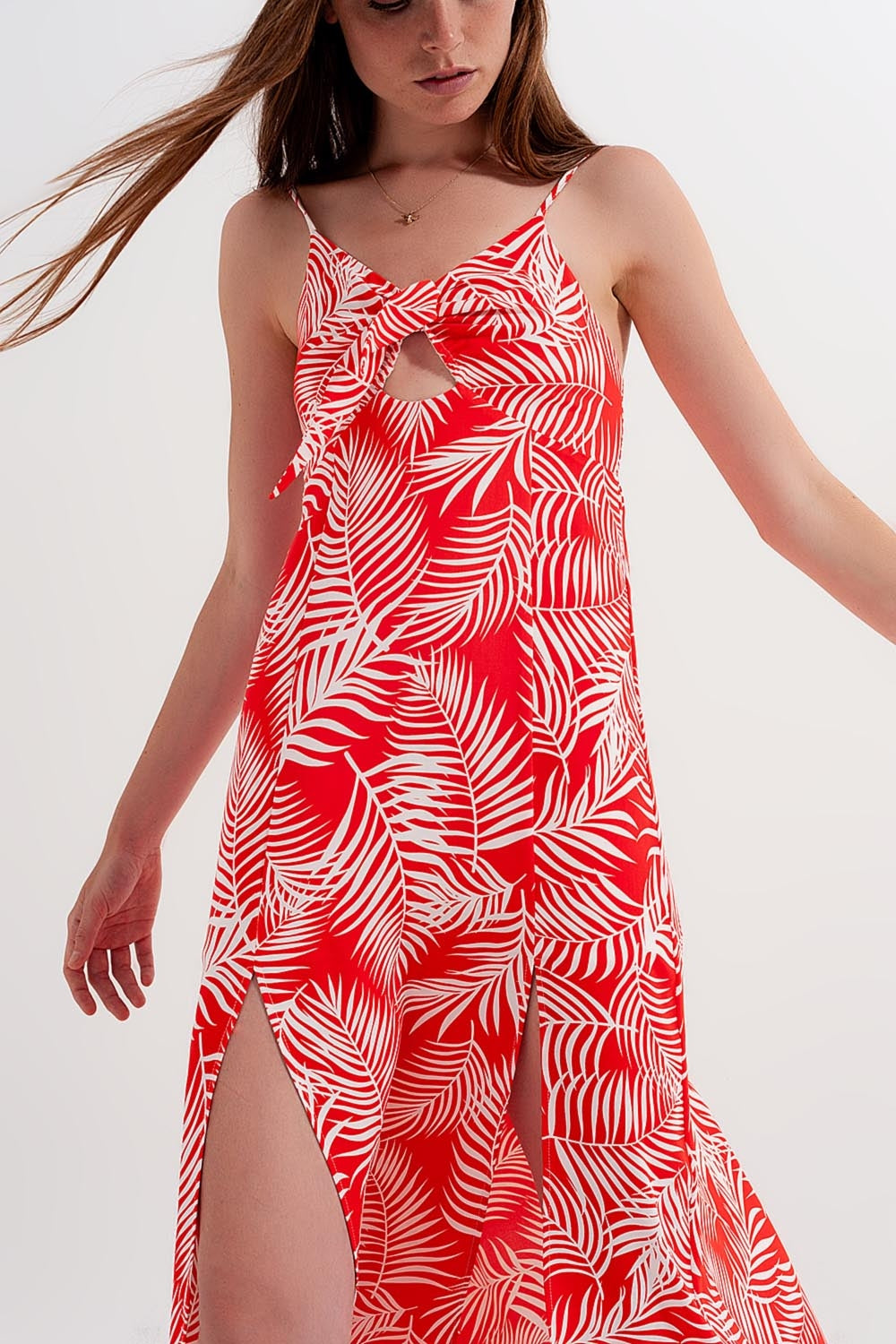 Maxi abito rosso con spacchi stampa a foglie