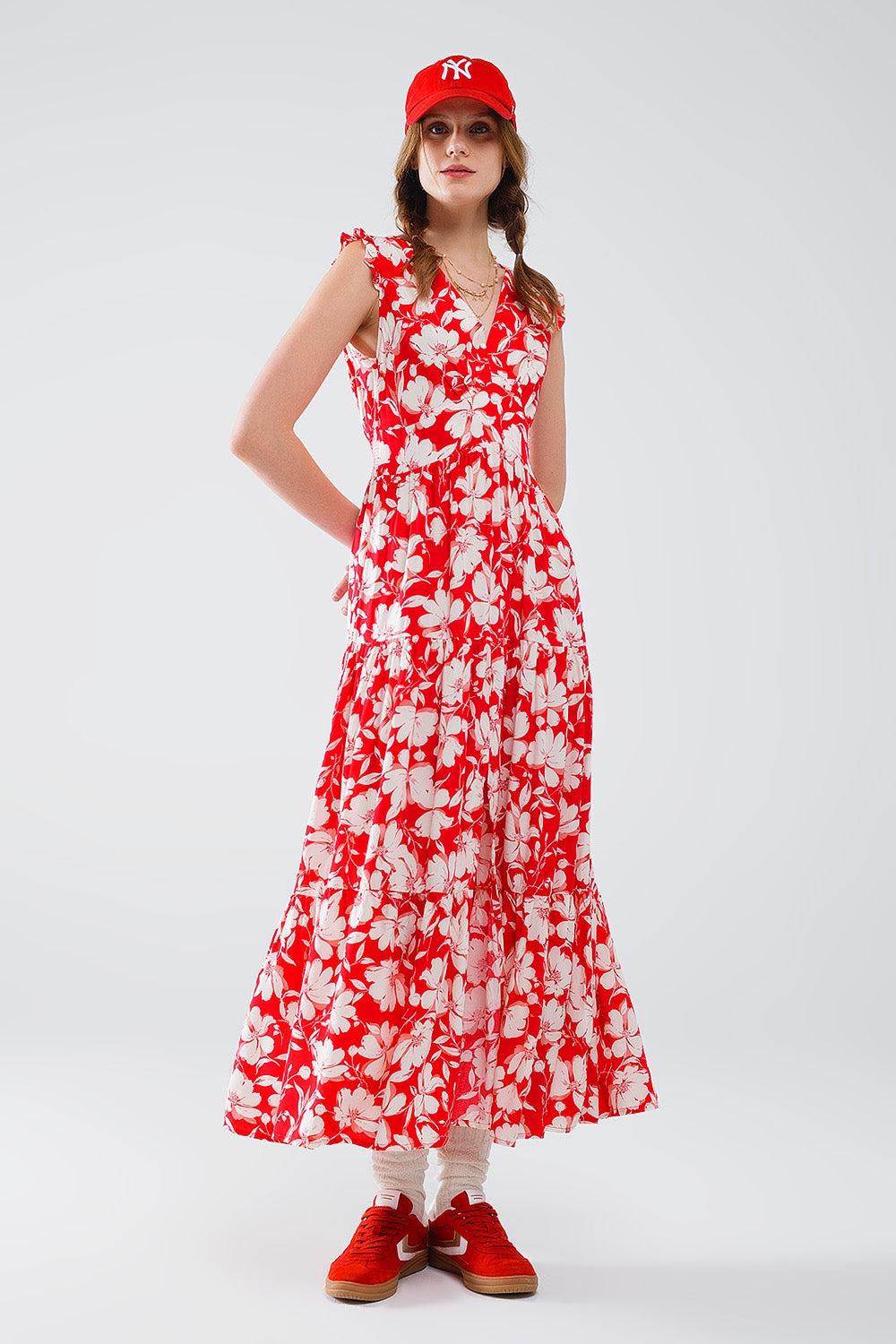 Maxi abito rosso con stampa floreale e scollo a V