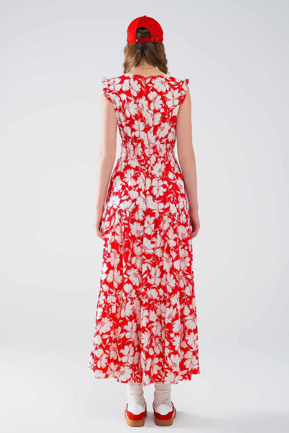 Maxi abito rosso con stampa floreale e scollo a V