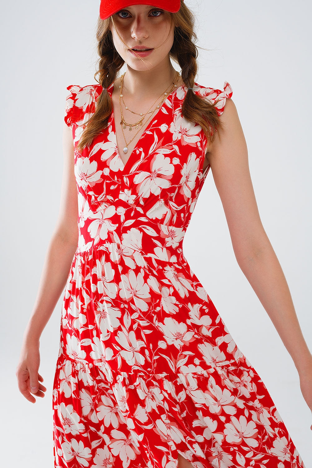 Maxi abito rosso con stampa floreale e scollo a V