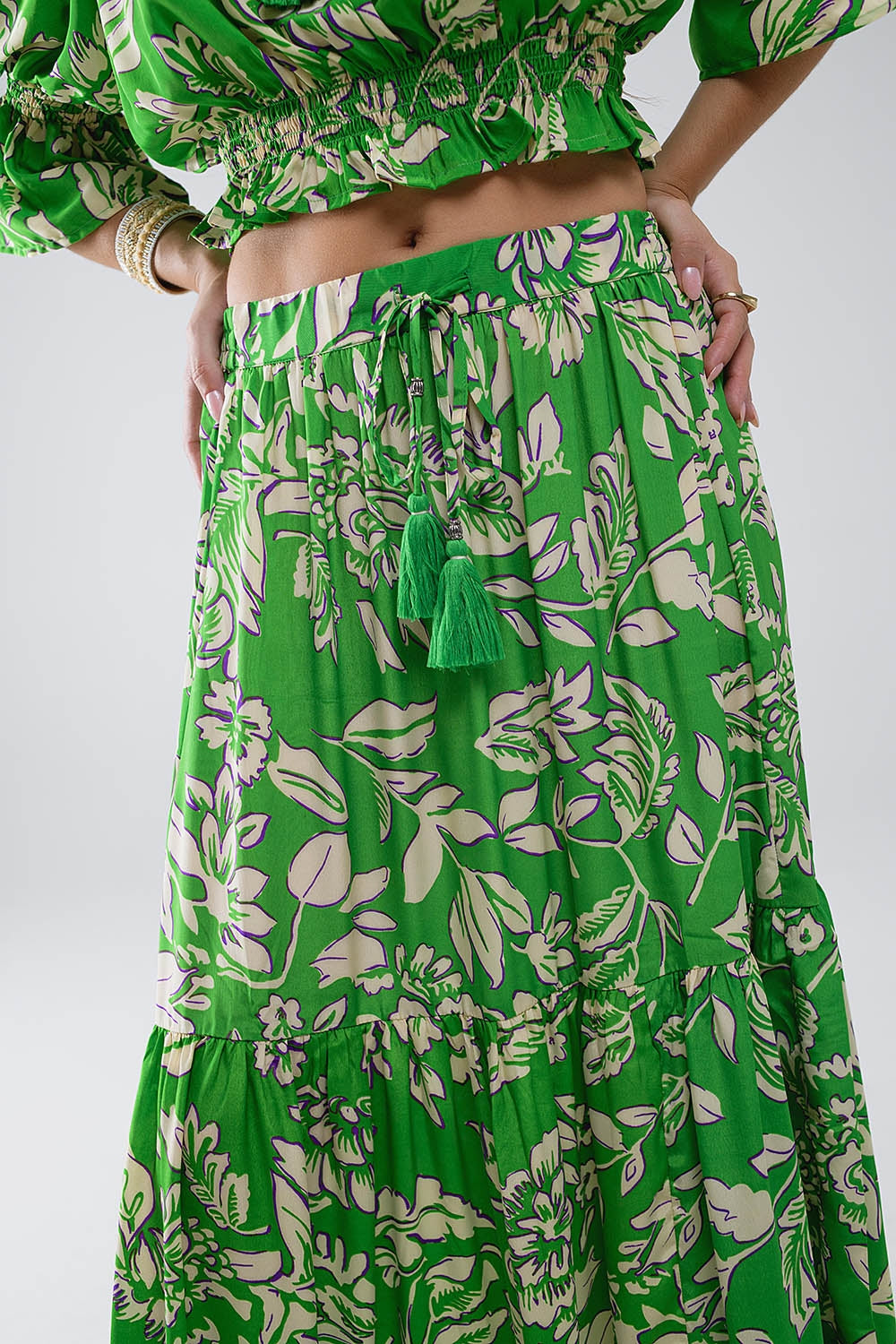 Maxi gonna a pieghe con stampa floreale verde