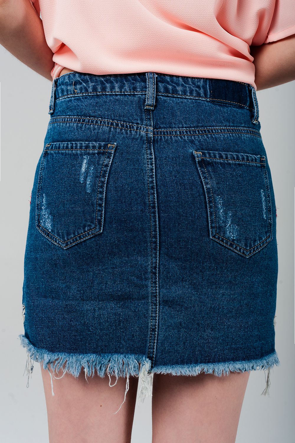 Mini gonna denim con fiori ricamati
