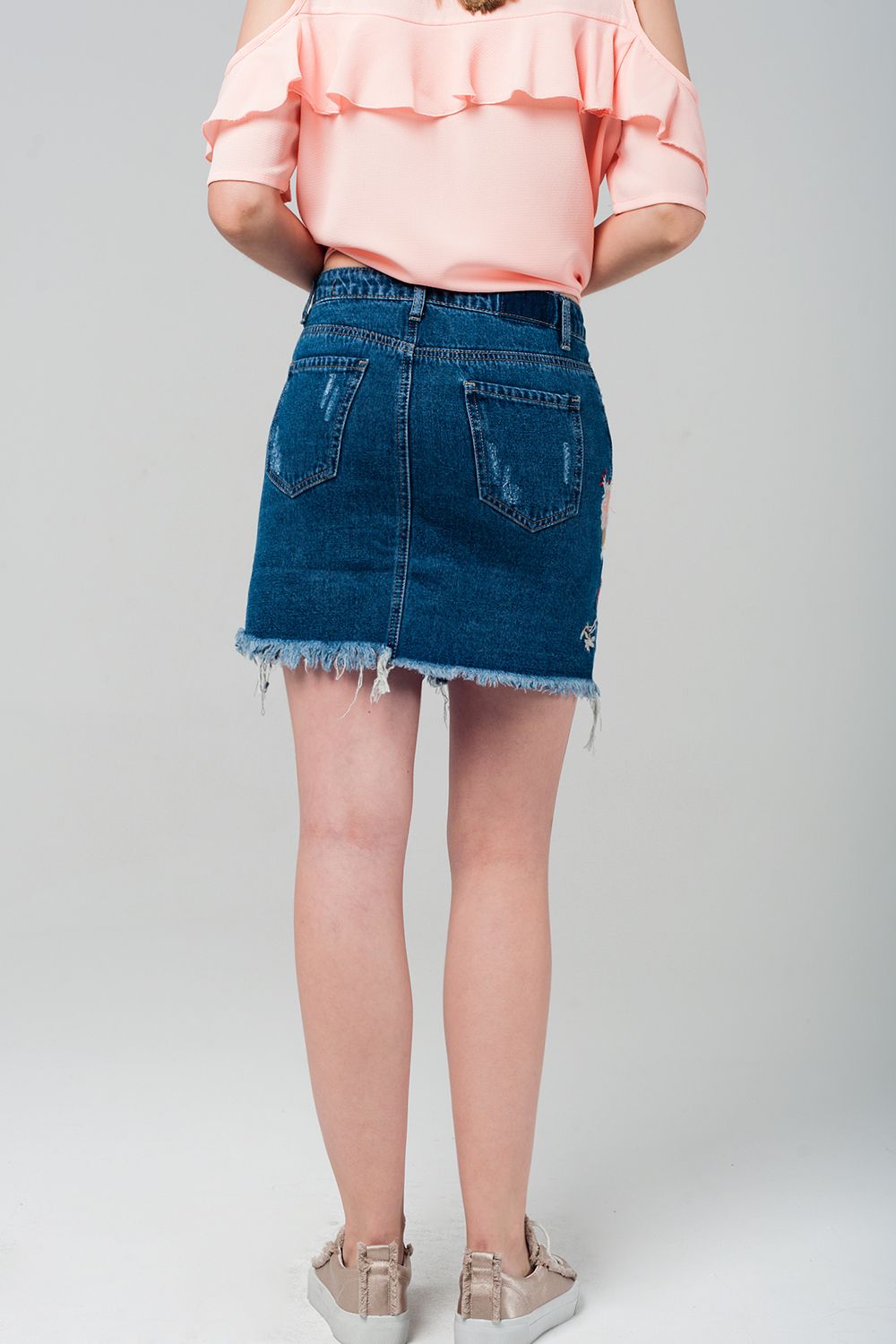 Mini gonna denim con fiori ricamati