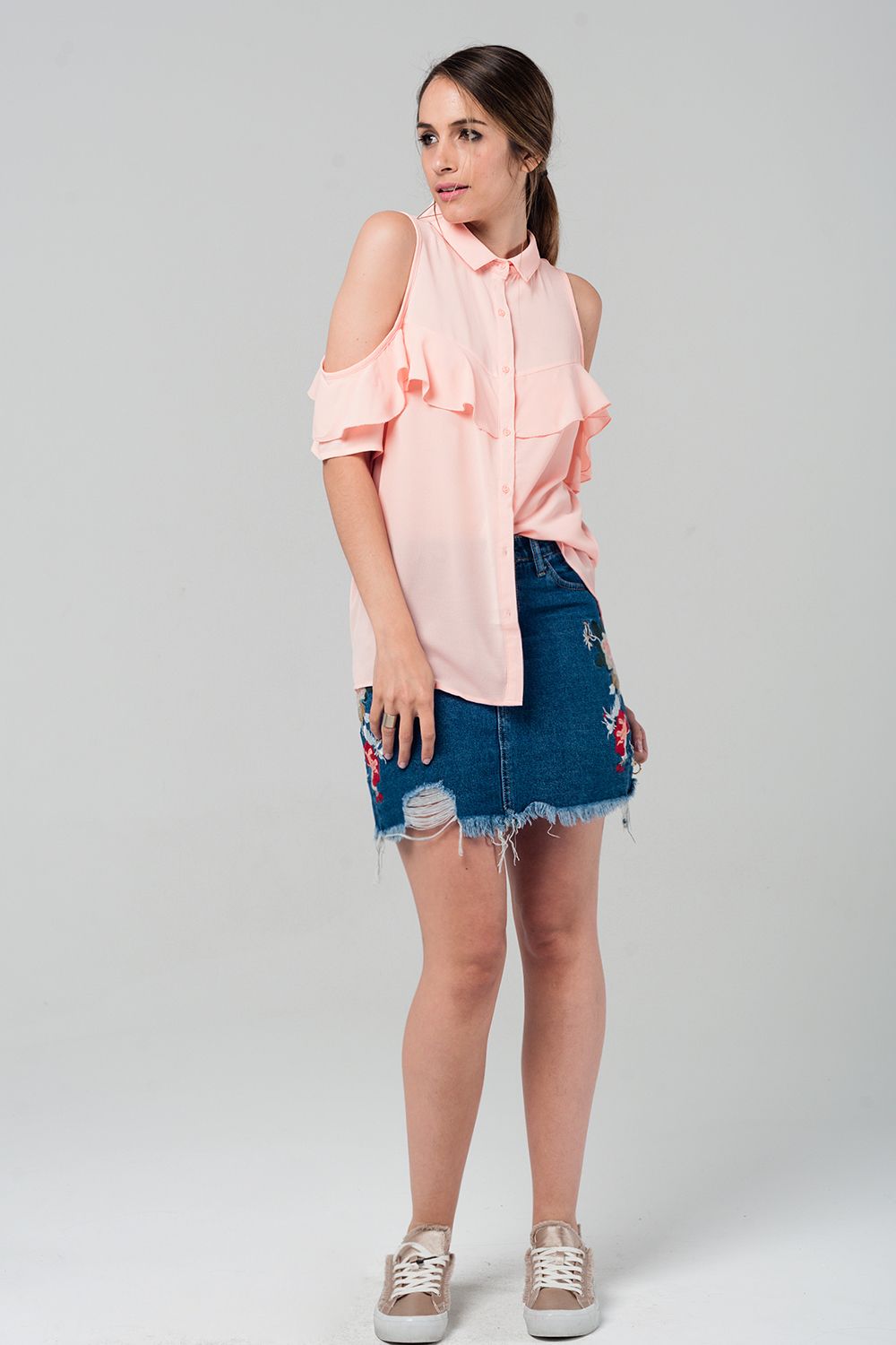 Mini gonna denim con fiori ricamati