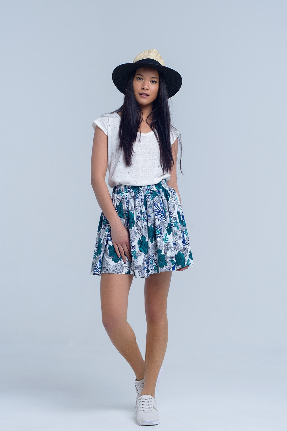 Mini skorts blu con stampa floreale