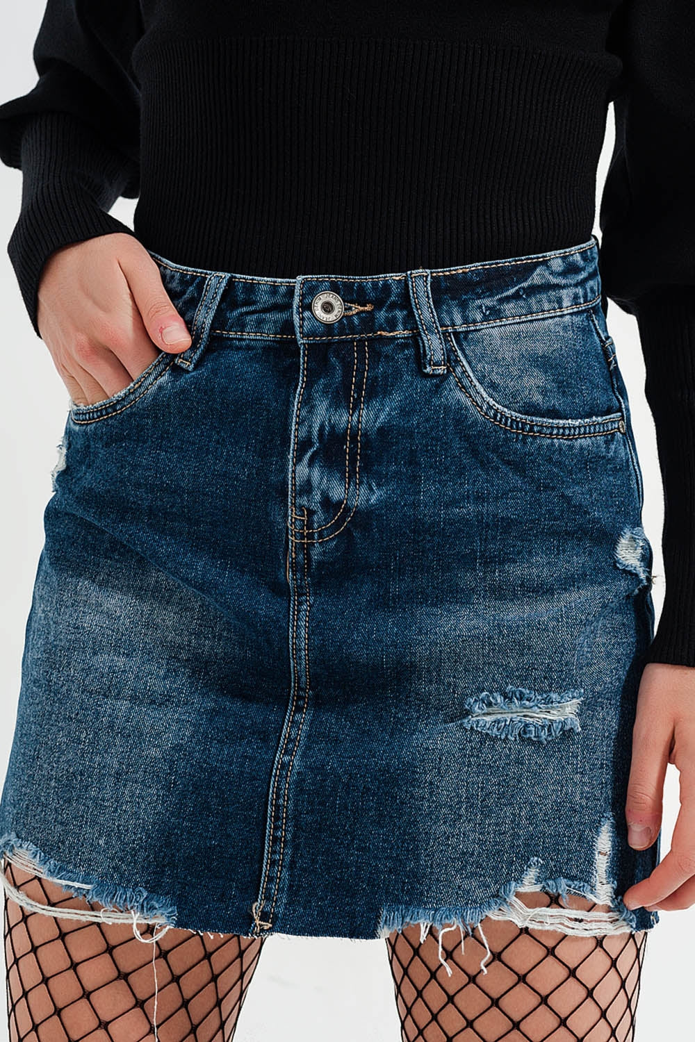 Minigonna denim effetto vissuto dettagli strappati